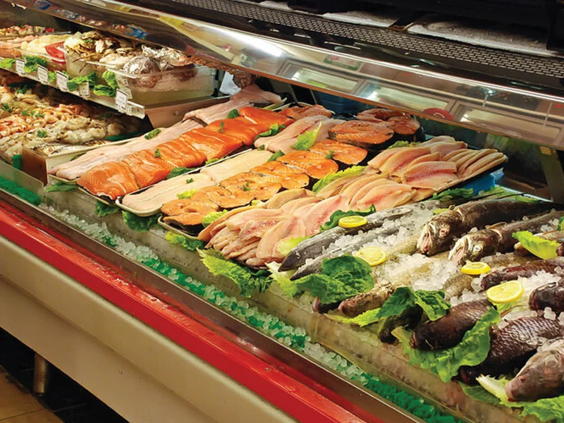 A counter with various seafood at Devon Market